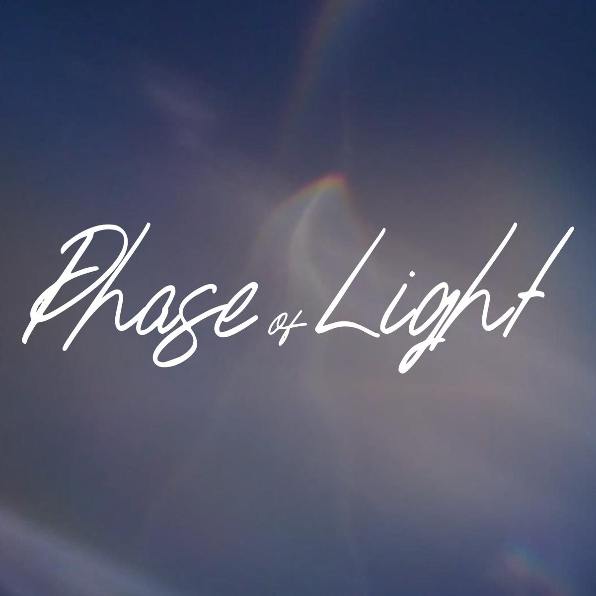 Phase of Light script text on clouds